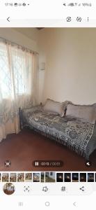 a picture of a bed in a room at Rafa y Nelly 2 in San Clemente del Tuyú