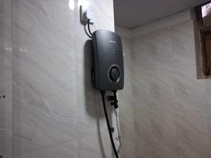 a speaker on a wall in a room at Slayan properties in Mudungoda