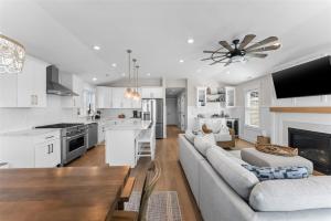 a kitchen and living room with a couch and a table at 921 Asbury Ave, Unit C in Ocean City