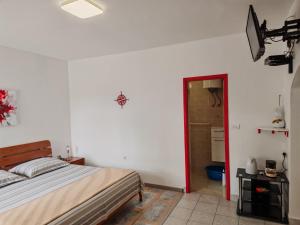 En eller flere senge i et værelse på Apartment Port Special