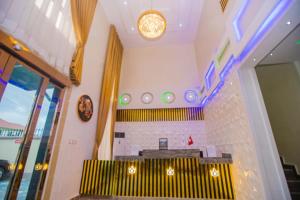 a room with aasteryasteryasteryasteryasteryasteryasteryasteryasteryasteryasteryastery at Chinbell Luxury Hotel & Suites in Lekki
