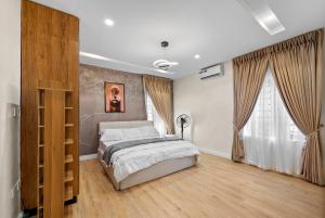a bedroom with a bed and a large window at The Zenith Palace in Lekki +7 photos