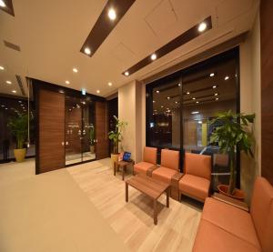 The lobby or reception area at Dormy Inn Abashiri
