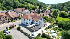 an aerial view of a large house in a village at Das Zollhaus Studio Newton nahe der Schweiz in Klettgau in Klettgau +20 photos