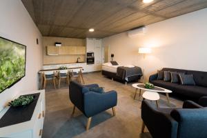a living room with a couch and a table at Residence Trafick in Prague