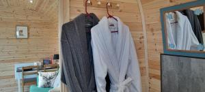 a room with clothes hanging on a wall at Foxwell in Ballina