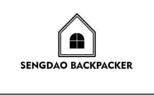 a logo for a backdoor to a backdoor to a backdoor to a house at Sengao backpacker in Vang Vieng