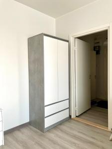 an empty room with a sliding glass door at Centerpoint Imatra in Imatra