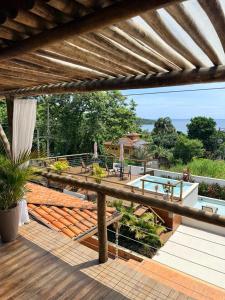 a view from the deck of a house at Santomar Guest House in Ilhabela