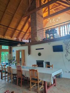 a large dining room with a table and chairs at WERK 2 - B&B Ecoturistic - Saschiz in Saschiz