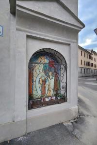 a mural on the side of a building at Santa Caterina 3 - San Bernardo in Crema
