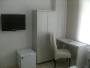 TV a/nebo společenská místnost v ubytování Linda