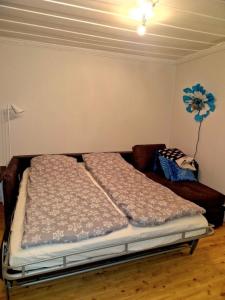 a bedroom with two beds in a room at Guesthouse in Öjebyn