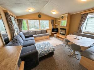 a living room with a couch and a table at The Bay Hideaway in Bucks Mills