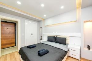 a bedroom with a bed with two pillows on it at İstanbul Amoria Guest House in Istanbul
