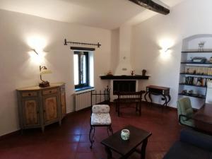 a living room with a couch and a table at Antico Mulino in Imperia
