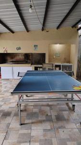 a ping pong table in a room with at CASA QUINTA Sasha in Sauce Viejo