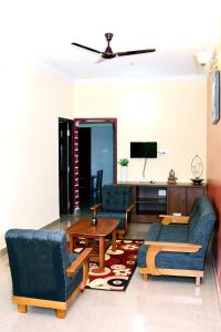 Posezení v ubytování Holidayincoorg Cozy Nest