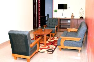Posezení v ubytování Holidayincoorg Cozy Nest