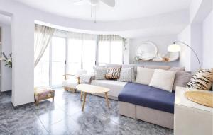 a living room with a couch and a table at Marisol Molina in Sueca +15 photos