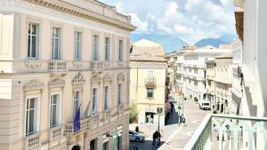a view of a city street with buildings at Bayab Charming Rooms - Corso Garibaldi in Benevento