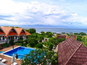an aerial view of a resort with a swimming pool at Darya Sea View by ABM in Nusa Penida