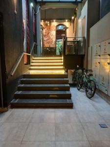 a staircase in a building with a bunch of bikes at zona balcarce in Salta