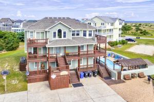 an aerial view of a house with a pool at SOSB26 South Beach Park #26-S in Salvo