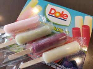 a bunch of popsicles in a box with chopsticks at Hotel 1-2-3 Takasaki in Takasaki
