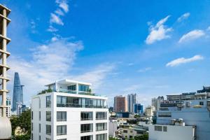 a view of a city skyline with buildings at Diamond Luxury Ben Thanh in Ho Chi Minh City