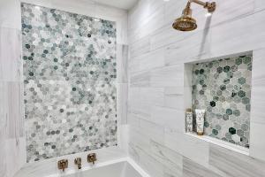 a white bathroom with a tub and a shower at FO13 Dreamcatcher in Frisco +33 photos