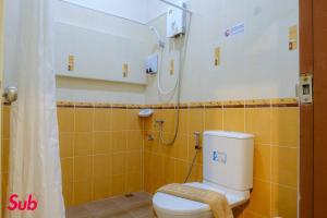 a bathroom with a toilet and a shower at Dream Home in Hat Yai in Ban Kohong +13 photos