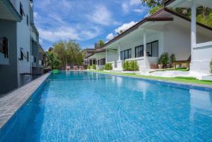 an image of a swimming pool in a house at The BRC Ao-nang Hotel in Ao Nang Beach