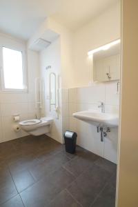 Ванная комната в BoardingHouse N22 Oberboihingen