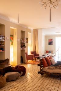 a living room filled with lots of furniture at Colibring nomads in Tbilisi City