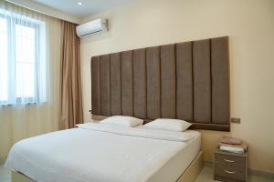 מיטה או מיטות בחדר ב-Luxury Collection Hotel