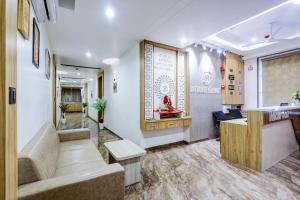 a lobby of a hospital with a waiting room at Hotel Lee Paramount in Gandhinagar