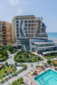 an aerial view of a resort with a swimming pool at Rafaelo Deluxe Hotel & Spa Shengjin in Shëngjin