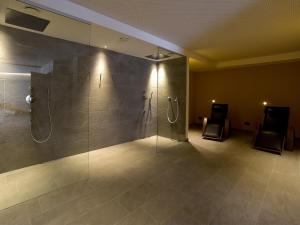 Koupelna v ubytování Hotel Vajolet + 37 fotografií