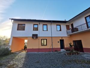 a house with a basketball hoop in front of it at Adagio Guesthouse in Caprie