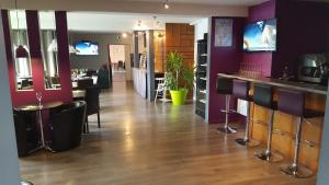 TV a/nebo společenská místnost v ubytování Fasthotel Dunkerque