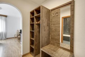 a bathroom with a walk in shower and a mirror at Hotel Relais Königsberg in Aachen +81 photos