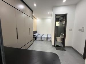 a room with a bedroom with a bed and a bathroom at Lien Home in Thôn An Hòa +22 photos