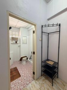 a bathroom with a toilet in a room at Saan Stay in Ban Krabi Yai +59 photos