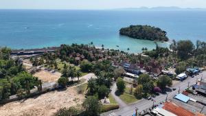 an aerial view of a town next to the ocean at Eid and Philippe's Home building A9 in Ban Ko Kwang