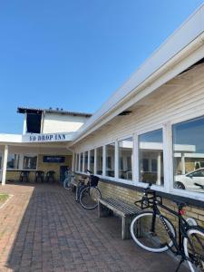 a group of bikes parked in front of a building at VØ Budget Drop Inn in Thisted