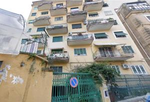 a tall building with balconies on the side of it at SergioCasa con vista a mare in Castellammare di Stabia