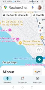 a screenshot of a cell phone with a map at Maison Manour Studio 4 personen in Mbour