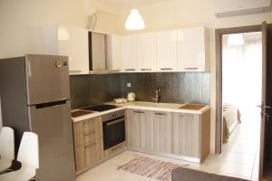 Kuchyňa alebo kuchynka v ubytovaní Polychrono Apartments