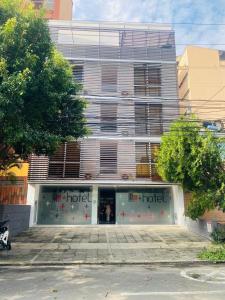 a store front of a building with the word hotel at Hotel King Versalles in Cali